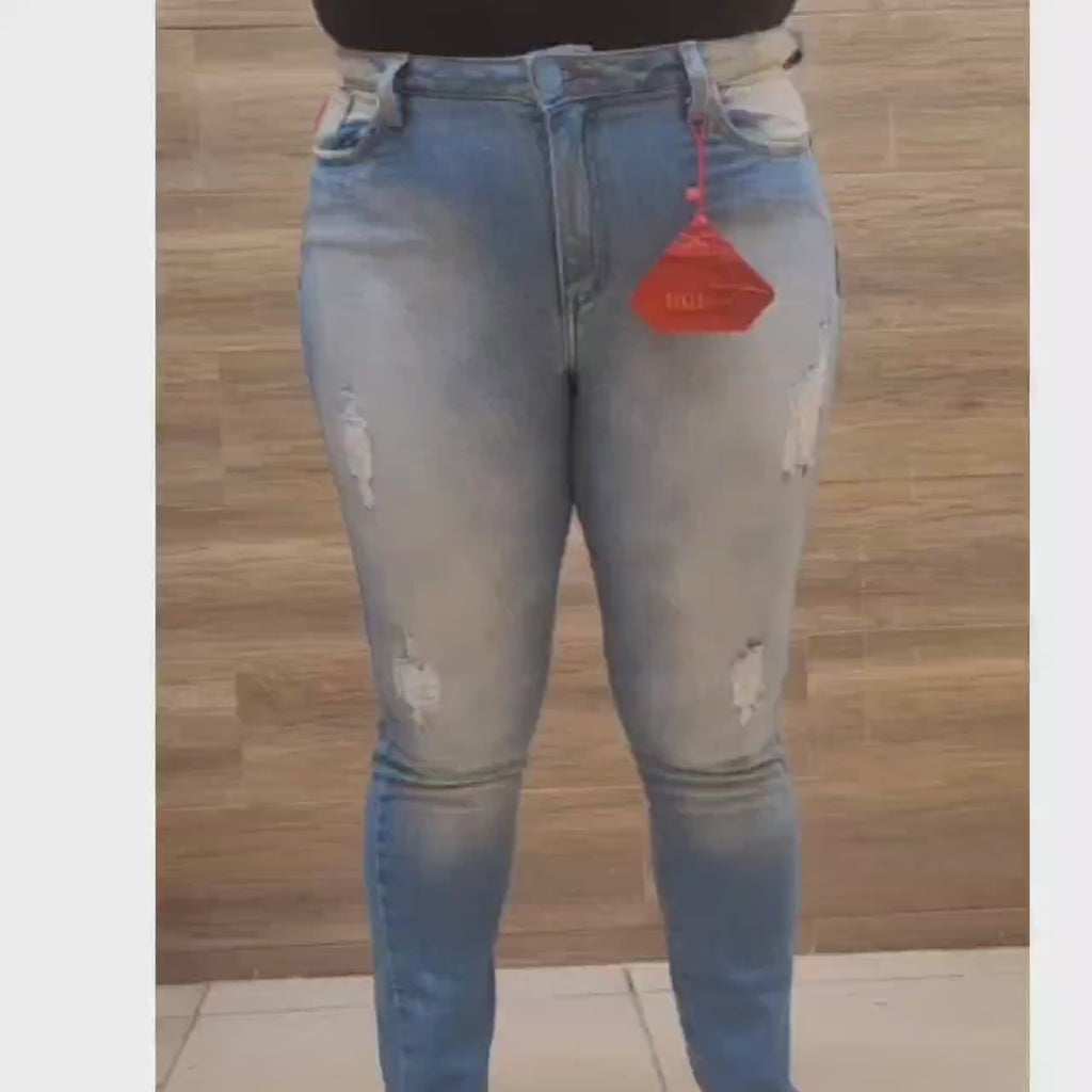 Calça Jeans Skinny Feminina com Barra Desfiada